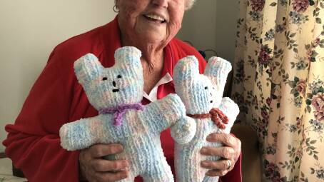 Val Rozysnki from Glen Innes, has knitted hundreds of 'trauma teddies' and donated them to the newly opened Glen Innes ambulance station . Picture supplied.