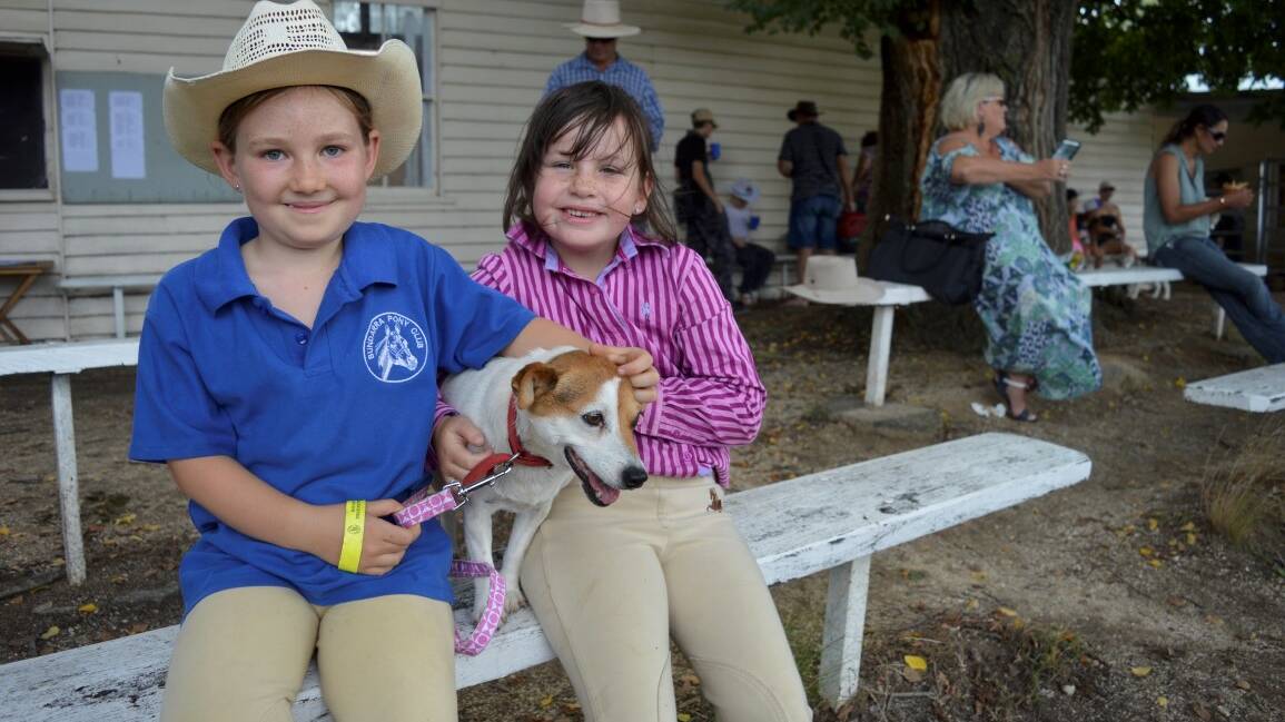 Ready for action: Delilah Ayton and Lucy Buckman with Mollie at the 2016 Bundarra Show. The pet competition will be held at the show this Saturday at 2pm.