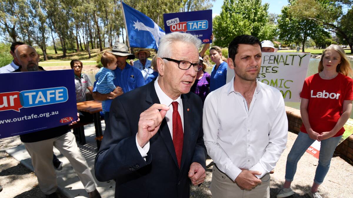 WARPATH: Senator Doug Cameron and Labor's New England candidate David Ewings were campaigning in Tamworth, focusing on cuts to penalty rates. Photo: Gareth Gardner