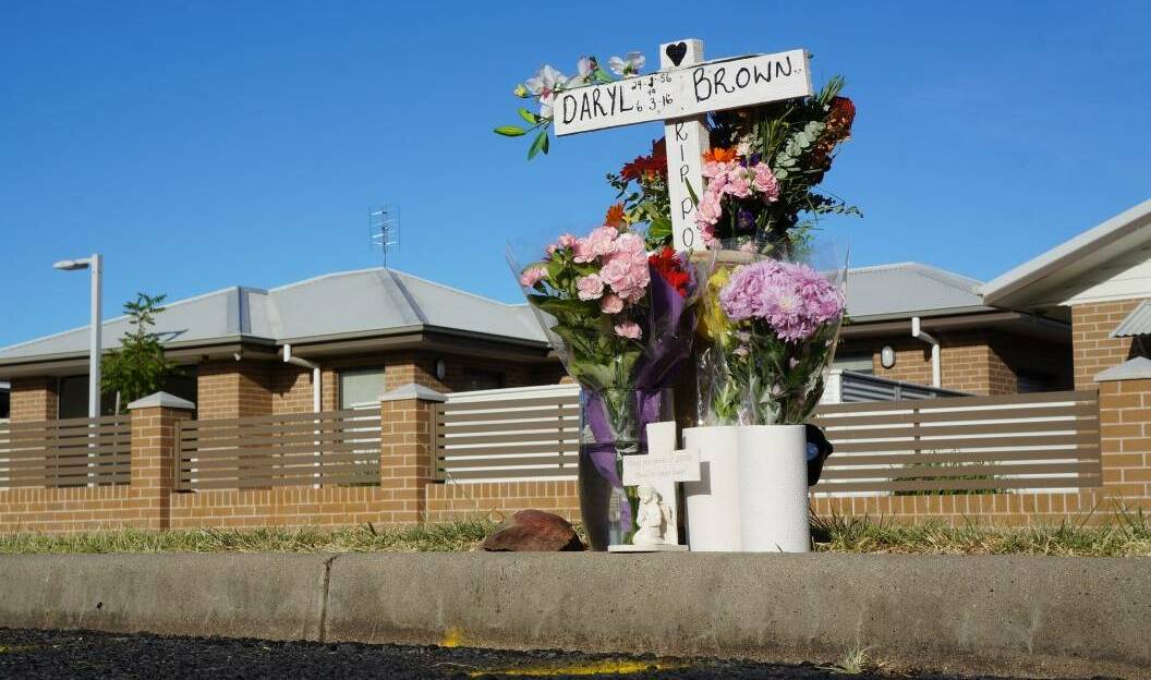 Innocent victim: The roadside memorial for Daryl Brown at the site of the fatal hit-and-run in Cameron St, Inverell, last year.