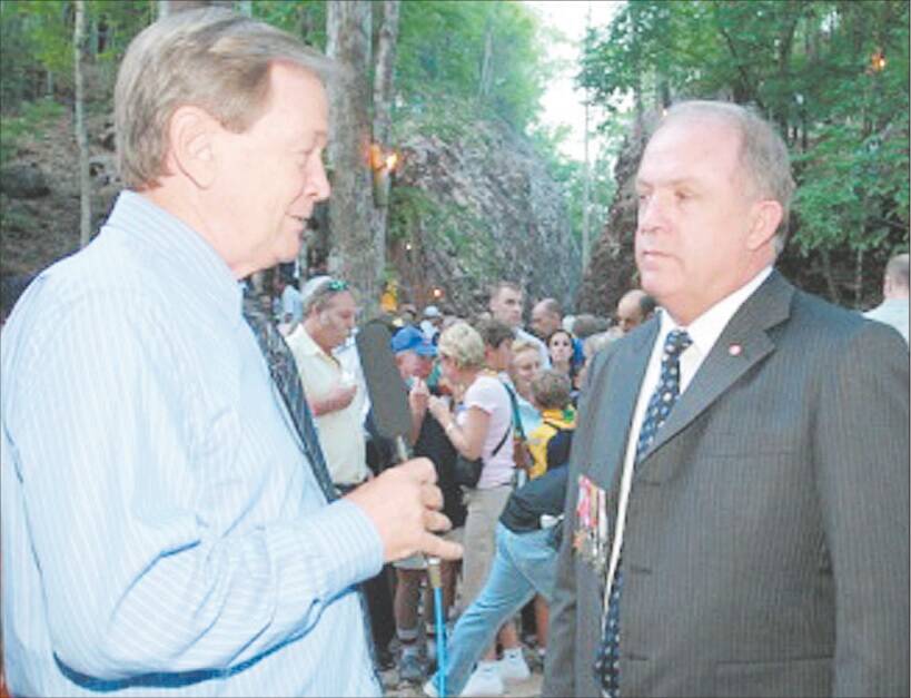 Senator John Williams is interviewed by a television reporter at Hellfire Pass in Thailand on Anzac Day, 2009.