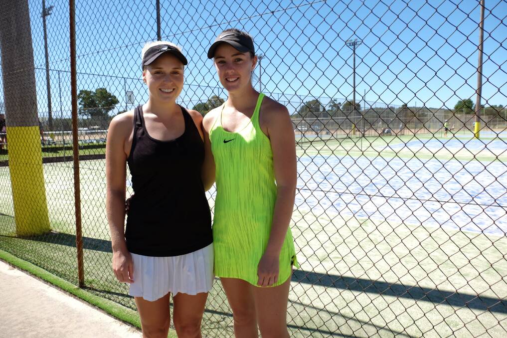 WINNING: Open women singles winner Gabby O'Gorman (right) with her winning doubles partner and friend Chloe Costelloe. Photo: Michele Jedlicka