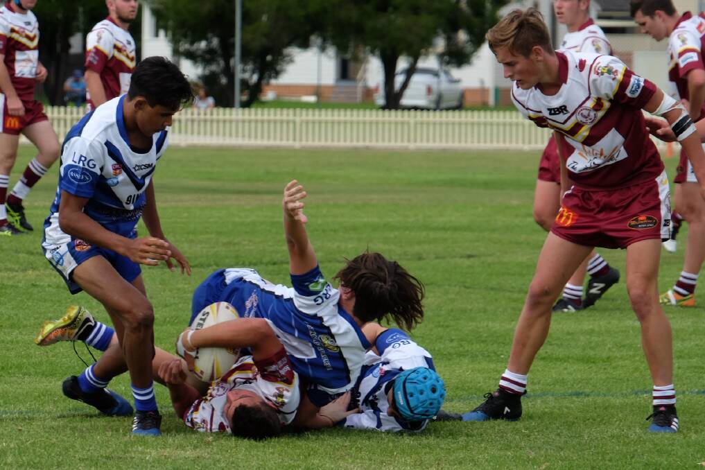 Moment caught during the under 18 match between the Inverell Hawks in their home opener against the Moree Boars, April 9, 2017. Photo: Michèle Jedlicka