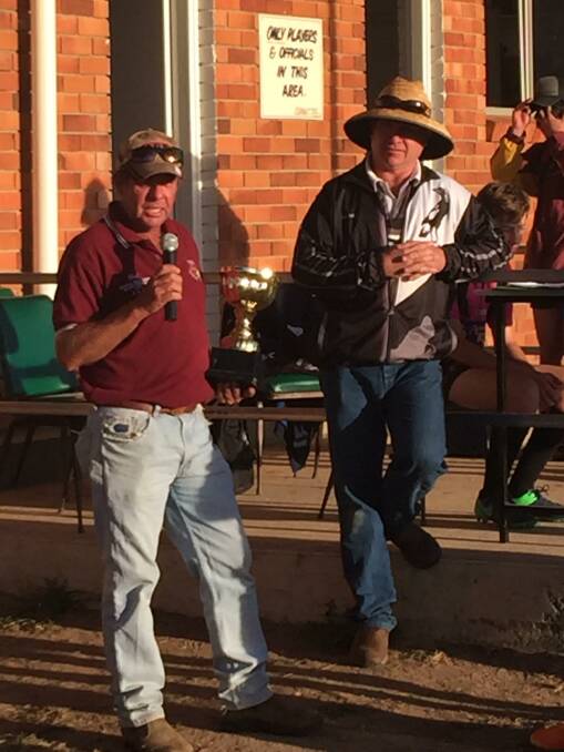 ACCEPTANCE: Inverell Minor League Hawks vice president Darryl Edmonds accepting the Gordon Creighton Cup. Photo contributed by Dick White