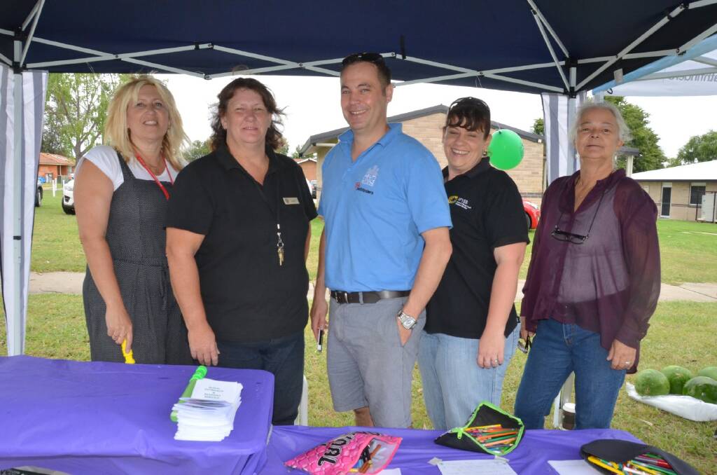 SUPPORT:  Jennifer Blackey (far right) with Abigail Pilgrim, Leanne Johnston, Brett Pischke, Jacinta Marsh at an Inverell Family Fun Day with information provided by local support services. Photo: Naomi Shumack
