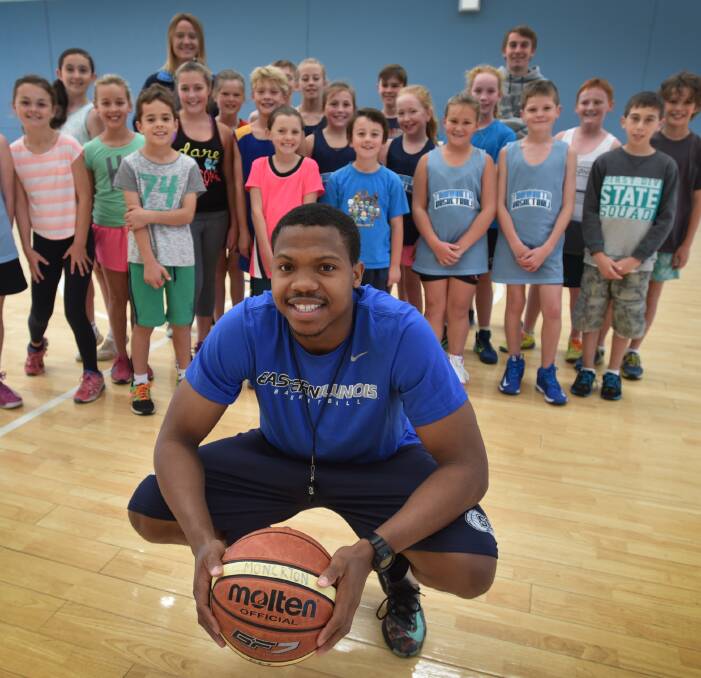 Inspiration: Jonny Miller made some new young basketball friends in Tamworth last year, and hopes it will happen in Inverell next week. Photo: Geoff O’Neill