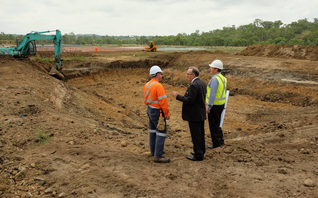 PIT-SIDE: Eire site engineer Mark Williamson with Inverell council deputy mayor Anthony Michaels and environmental engineer Michael Bryant. Photo: Michèle Jedlicka