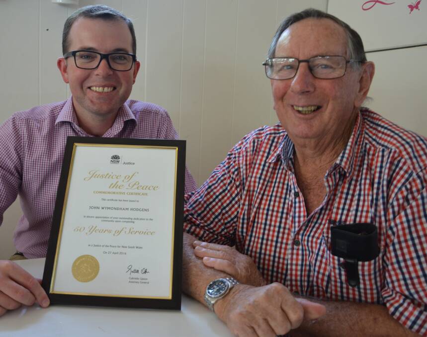 STAMP OF APPROVAL: Northern Tablelands MP Adam Marshall with local long-time JP John Hodgens. 