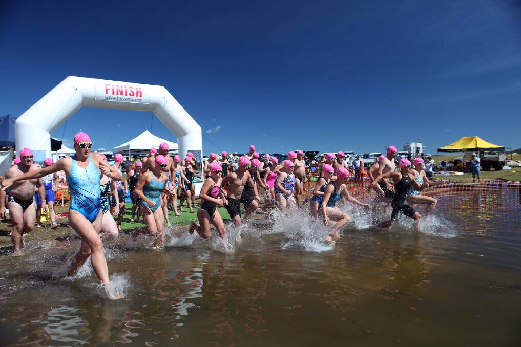 Scene from the Copeton Swim, a now successful annual competitive event, one of many activities that complements the many assets of the Copeton Holiday Park which caters to the caravanning and camping industry.
