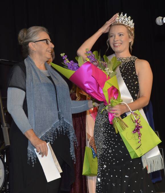 ASTONISHED: The 2016 Sapphire City Festival Queen Gaby Watkins grinning with festival sponsor representative Wendy Wilks. 