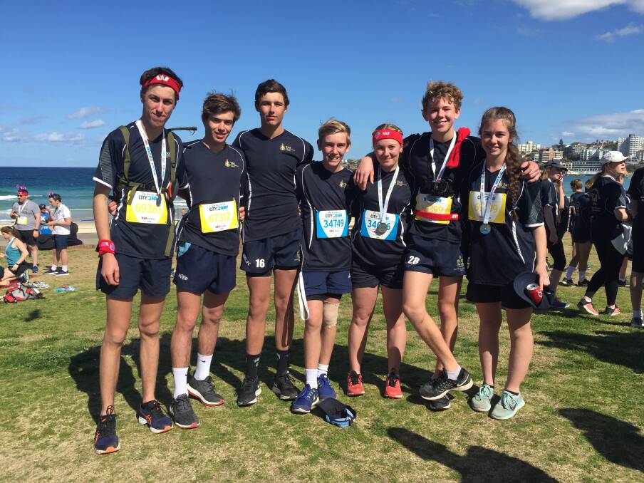 Inverell district students George Lane, Alex Ziesemer, Harry Tombs, Wally Bremner, Bonnie Bremner, Hugh Worsley and Molly McLachlan put in fantastic efforts to complete the City to Surf fun run. Photo contributed