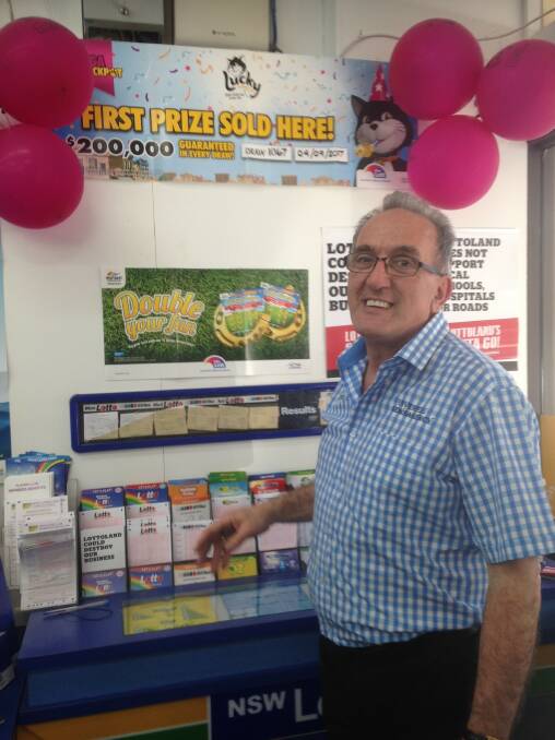 Unclaimed winnings: Inverell newsagency owner Anthony Michael is keen to see the lucky ticket holder come forward. 