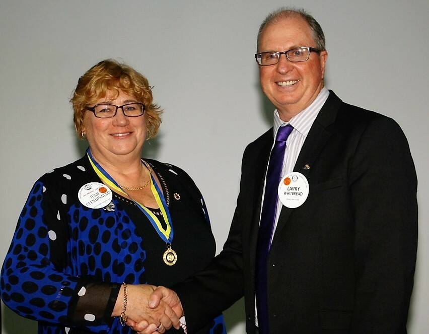 Honoured: Julie Glendinning with outgoing Inverell East Rotary president Larry Whitbread at the award presentation. 