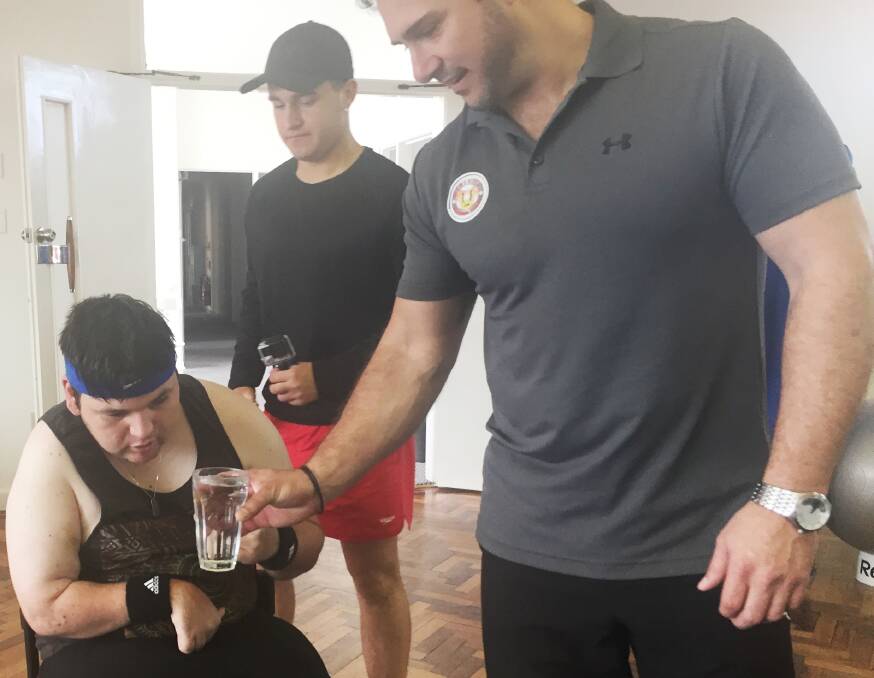 Hydrate when you exercise: Ryan with Willis and Joey during the training session.