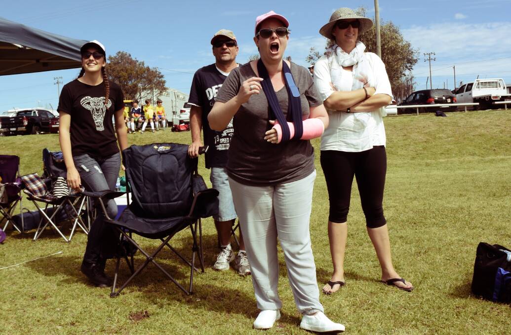 Ashley Brown with dad Daryl and mum Kirsten, and Bev Zelinski: their boys won their first game.