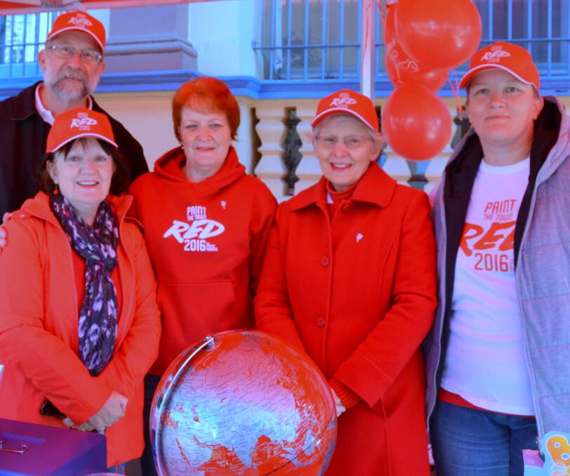 Peter McGregor, Judy Rily, Leigh Rex, Rhonda McGregor and Meagan Gaukroger manning the stall on Saturday.