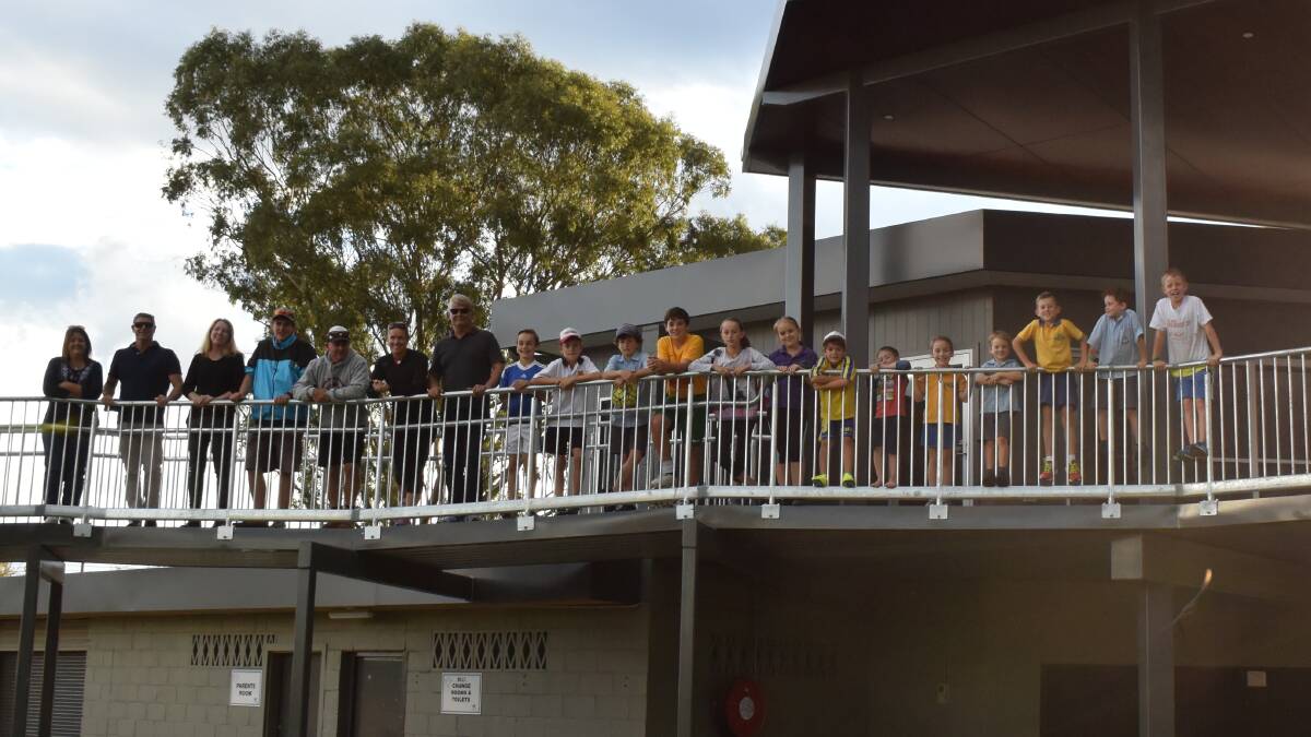 Inverell players, parents and coaches enjoy their new clubhouse.