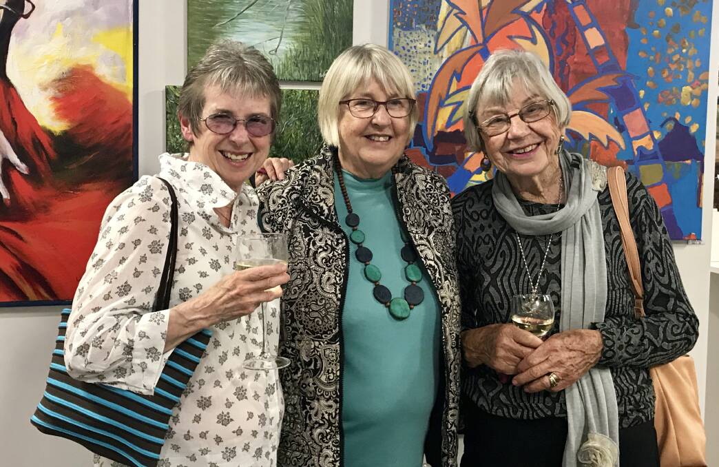 Kathryn Rorke, Junette Peasley and Beth McNeil enjoy happy hour at the Inverell Art Gallery as part of the festival. Photo by Henry Smith.