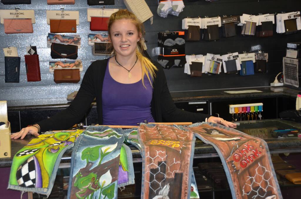 PAST WINNERS: Amber Strickland displays the creative jeans that took out the top prize in previous years.