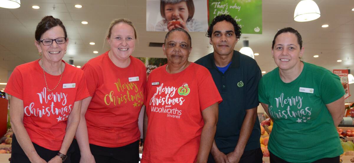 Laura Blacklock and David Binge (centre) have already proved themselves as valuable Woolworths employees.