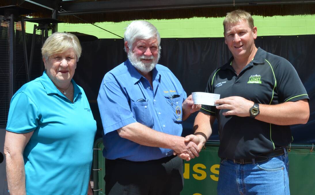 Australian Hotel co-owners Glenda and Damien Smith present Inverell Lions Club president Peter Kearsey (centre) with a $1000 cheque for the initiative.