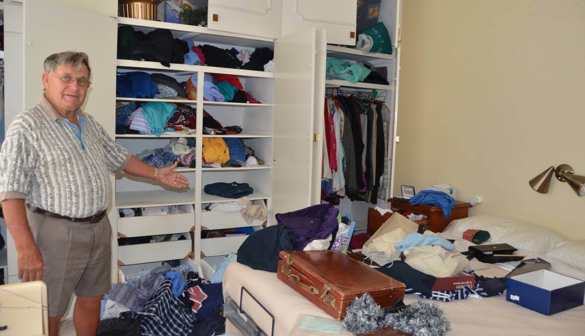 VIOLATED: Bill Gowlett shows the mess thieves left in his bedroom after the second break-in in two months.