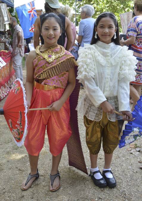 Traditional: Anita Thivakon and Sara Srithong in Thai costumes.