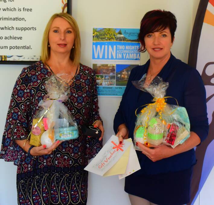 Excited: Tracy Farrugia and Annette Gooda display some of the prizes up for grabs.