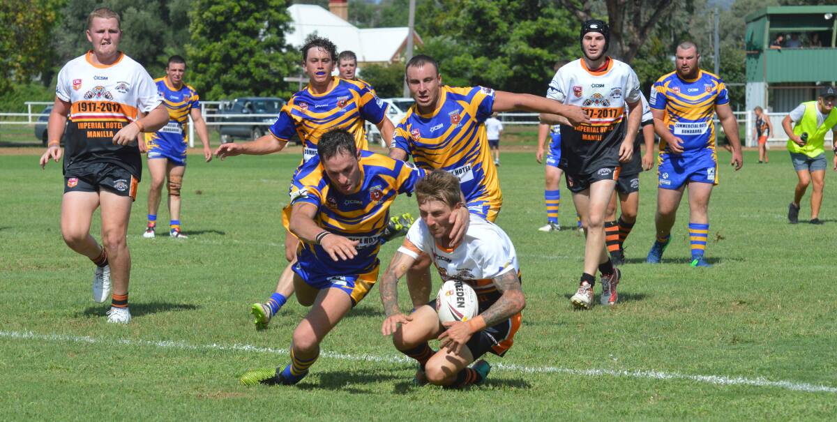 Bundarra captain-coach Luke Deaves chases through on his grubber kick to score the Bears opening try in their loss to Manilla on Saturday.