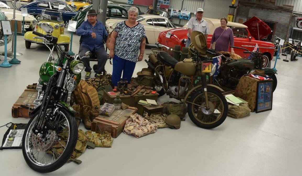 Ron and Judy Sims and Bob and Ros Johnson with the Anzac Day display at the Inverell Transport Museum.