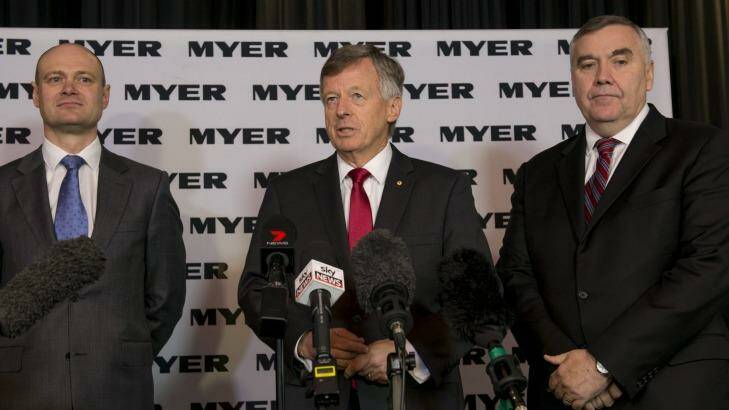 Incoming Myer CEO Richard Umbers (left), Myer chairman Paul McClintock (centre) and outgoing CEO Bernie Brookes (right) speak to the media after the company announced its change in leadership. Photo: Jesse Marlow