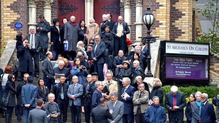 Crowds wait at St Michaels across Russell Street for the state funeral of former prime minister Malcolm Fraser at Scots' Church in Melbourne. Photo: Joe Armao