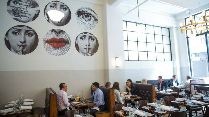 Fornasetti wallpaper makes a striking feature at Massi in Melbourne. Photo: Supplied
