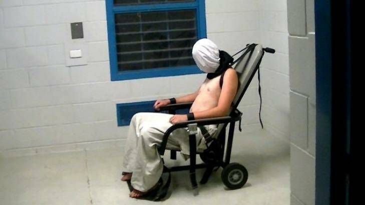 An image from the Four Corners program of boy strapped to a chair. Photo: ABC