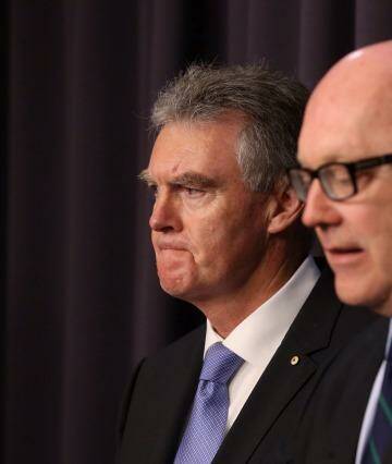 Duncan Lewis, the new director-general of ASIO, and Attorney-General George Brandis insist Australian security forces will not torture suspects. Photo: Andrew Meares