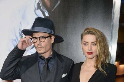 'Very much in love': Johnny Depp and Amber Heard at the premiere of <i>3 Days To Kill </i> in Hollywood in 2014. Photo: Kevin Winter / Getty Images