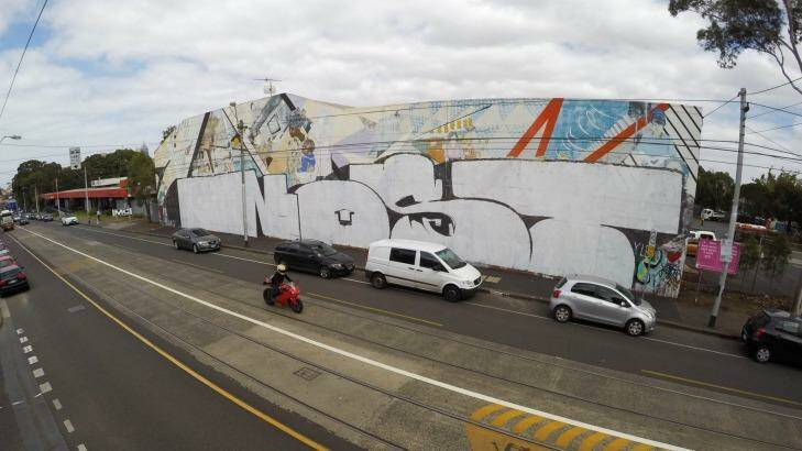 The potential development site's  Smith Street border is home to the recently defaced iconic 1980s feminist mural. Photo: JOE ARMAO