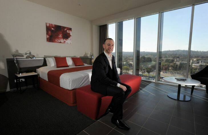 News/Gallery. The refurbished 11 storey Juliana House in Bowes Street, Woden Town Centre. The former office block, housing public servants, is now the latest Abode Apartment Hotel built by Geocon. Geocon Managing Director, Nick Georgalis, in a room on the 7th floor. September 4th. 2013 Canberra Times photograph by Graham Tidy. Photo: Graham Tidy
