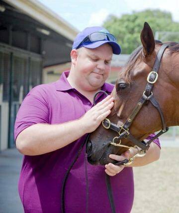 Nathan Tinkler with a horse from his stables at the 2010 Magic Millions: Photo: Glenn Hunt
