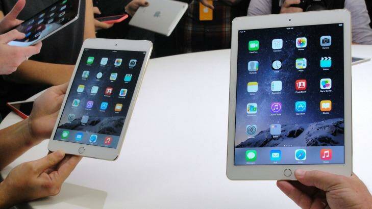 The new  iPad Mini 3 (left) and iPad Air 2 launched. Photo: Glenn Chapman
