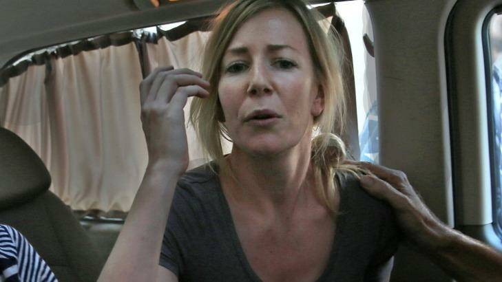 Sally Faulkner in a mini van shortly after she was released. Photo: Hussein Malla/AP