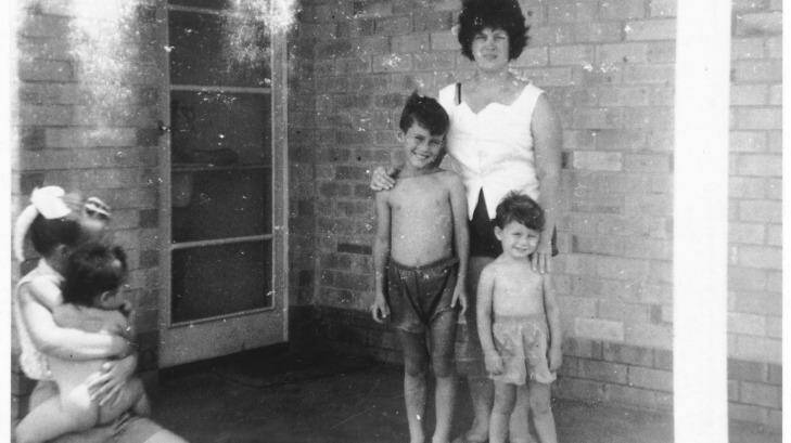 Jimmy and brother Alan with their mum on the front porch of their home in Elizabeth. 'That is the door Mum used when she left us.' Photo: Barnes Family Collection