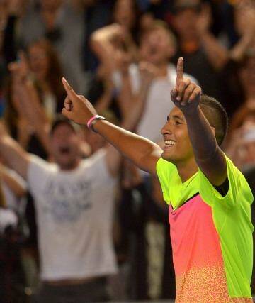 The battle is won: Nick Kyrgios shows his elation after his five-set win over Andreas Seppi. Photo: Joe Armao