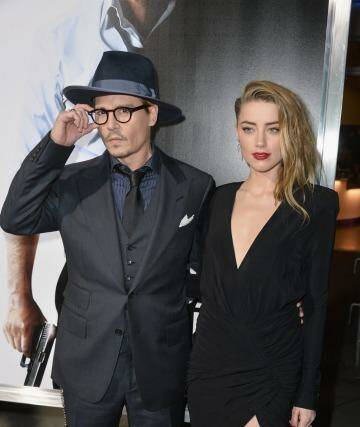 'Very much in love': Johnny Depp and Amber Heard at the premiere of <i>3 Days To Kill </i> in Hollywood in 2014. Photo: Kevin Winter / Getty Images