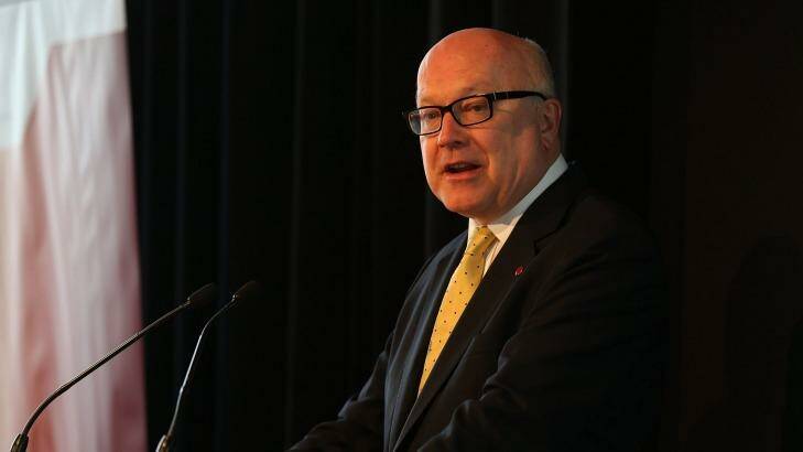 Attorney-General George Brandis tasked the commission with reviewing federal laws for sections that interfere with "rights, freedoms and privileges". Photo: Anthony Johnson