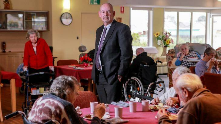 Kalyna Care CEO Darren Leech with residents eating lunch at the former Ukrainian aged care home Photo: Wayne Taylor