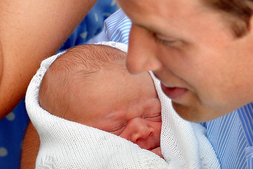 William, the Duke of Cambridge with his newborn son George.