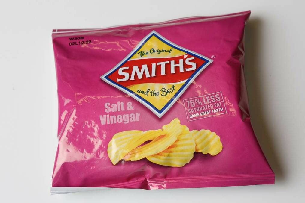 Secret vice: Smith's salt and vinegar chips. 'It's bad, I know. I like the crinkle cut,' Grossi confesses. Photo: Eddie Jim