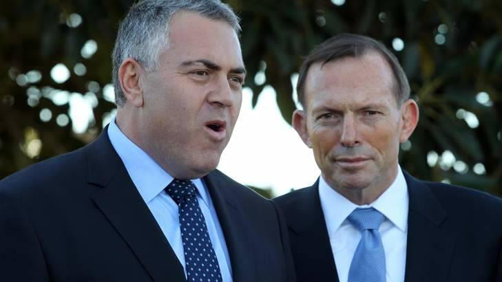 Prime Minister Tony Abbott and Treasurer Joe Hockey are cool on expanding sanctions against Russia. Photo: Jonathan Ng