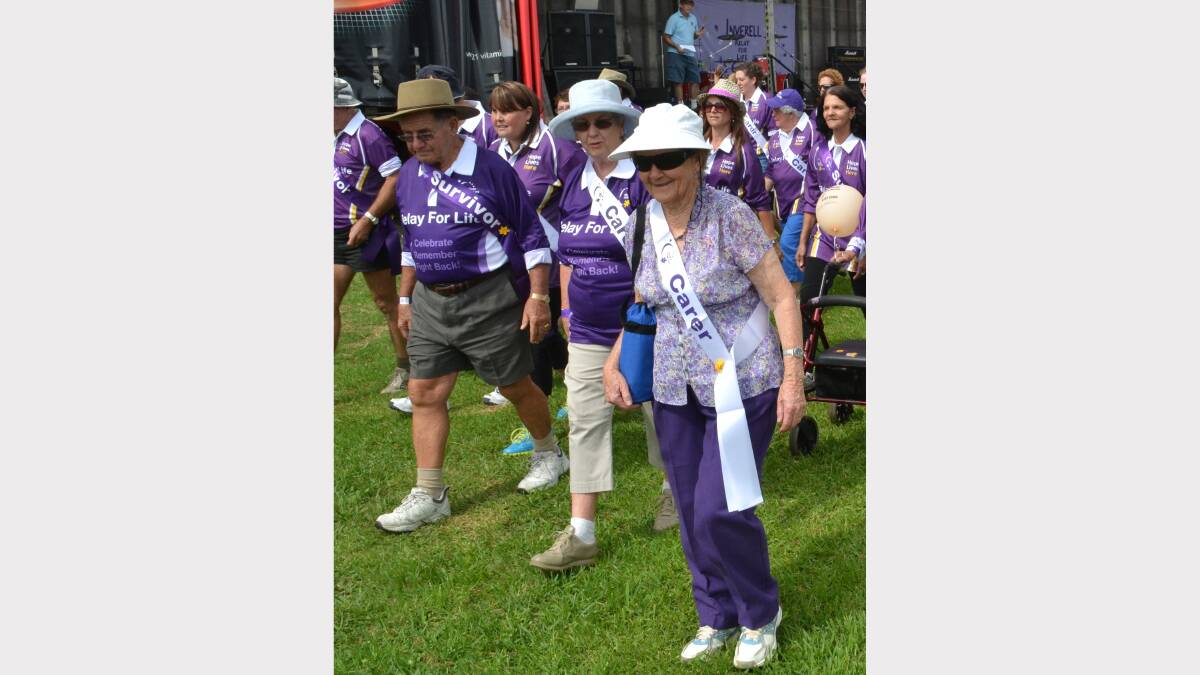 Bill and Pam Gowlett and Margaret Eddy set off on their carers and survivor's walk. Photo No 8619